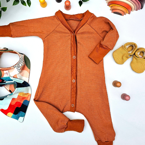 Combinaison évolutive bébé en nid d'abeille